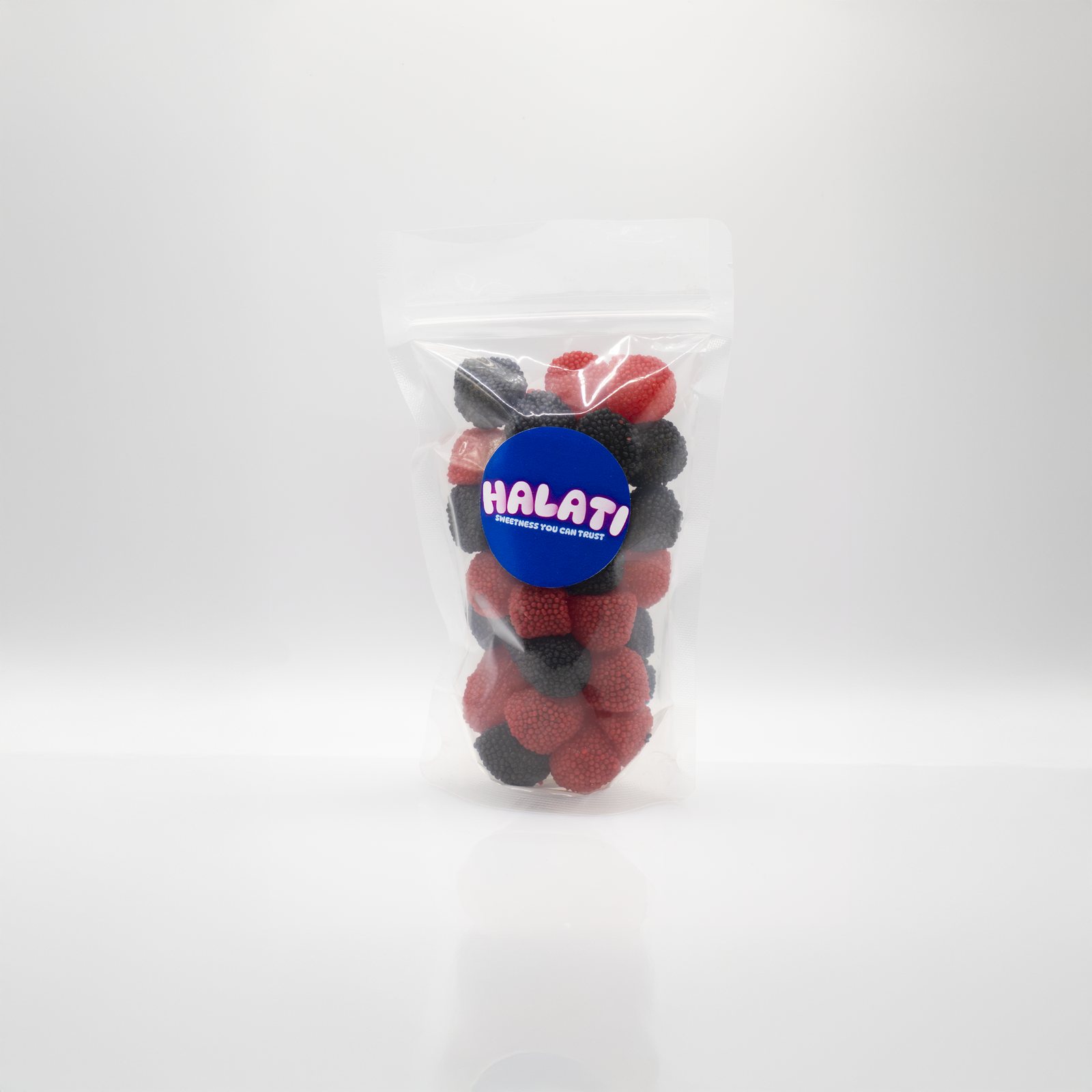 HALATI pouch filled with dark berry gummies