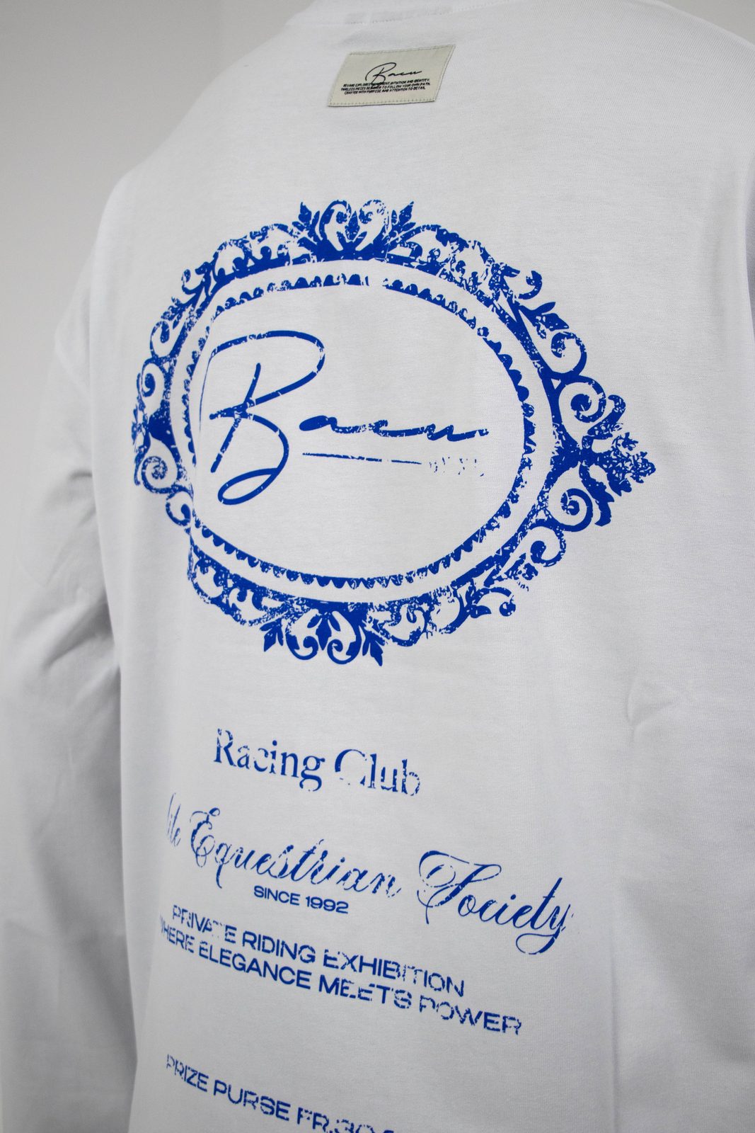 Close-up of the blue BACU Racing Club back print