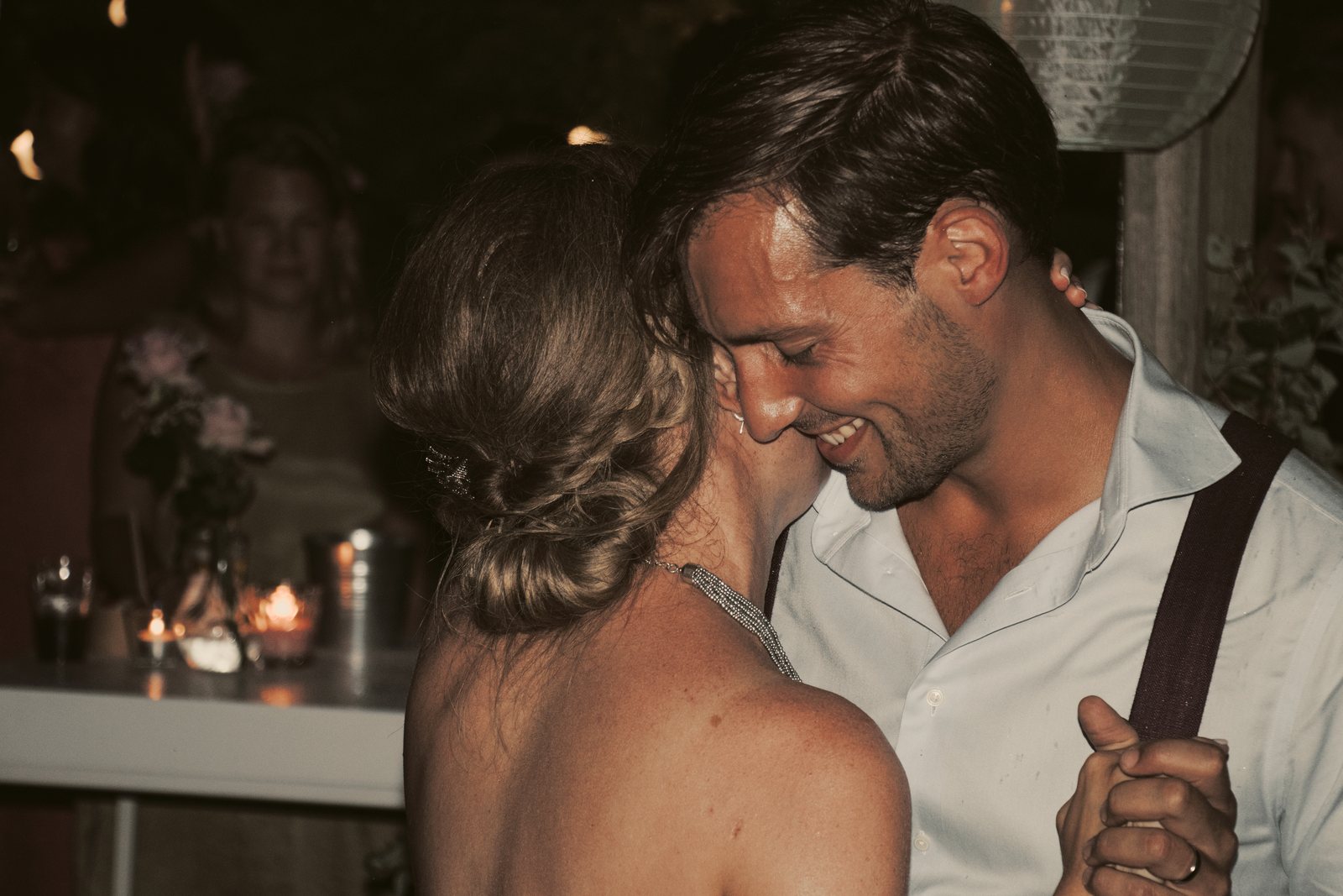Imre and Chris during their first dance, foreheads close