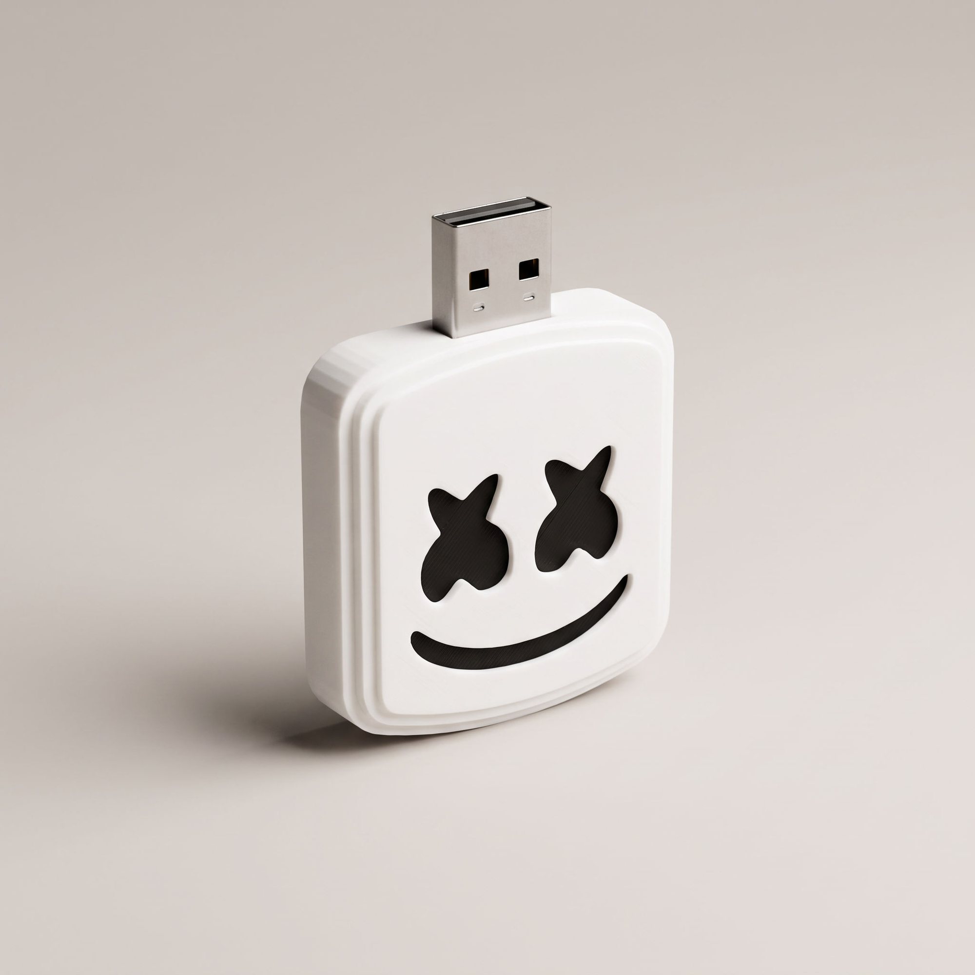 White rounded USB stick with black X eyes and a smile